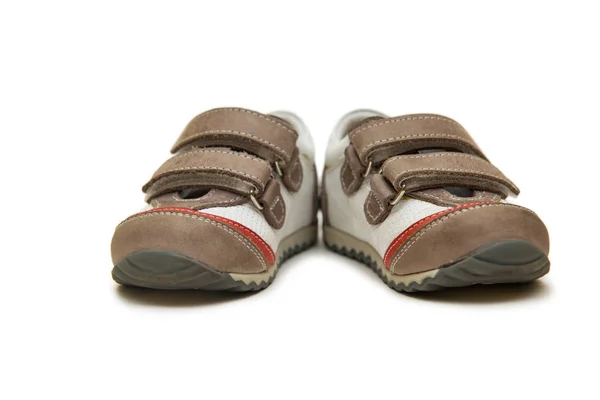 Baby schoenen geïsoleerd op de witte achtergrond — Stockfoto