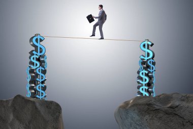 İş adamı sıkı bir ipte yürüyor