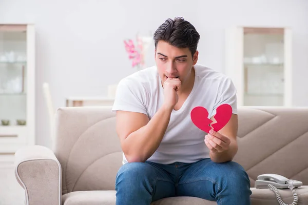 Young man in sad saint valentine concept — Stock Photo, Image