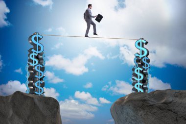 İş adamı sıkı bir ipte yürüyor