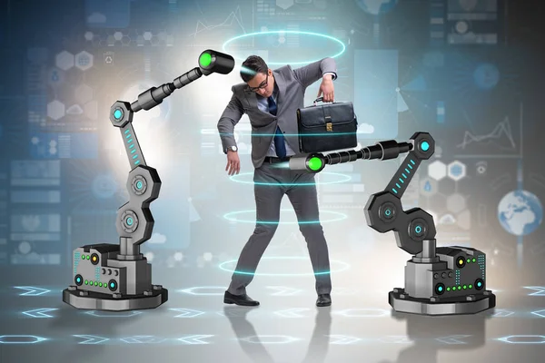 Empresario manipulado por brazos robóticos — Foto de Stock