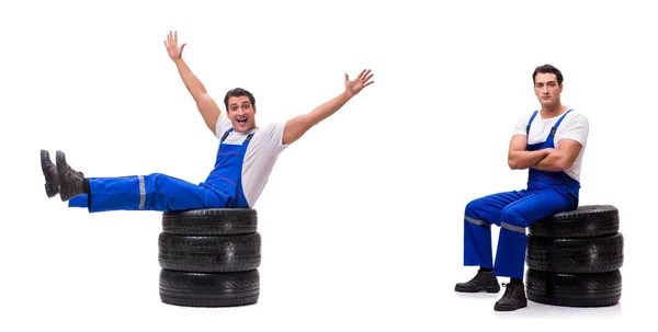 Handsome tyre repairman isolated on white — Stock Photo, Image