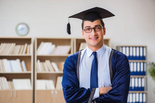 Young man graduating from university — Stock Photo, Image