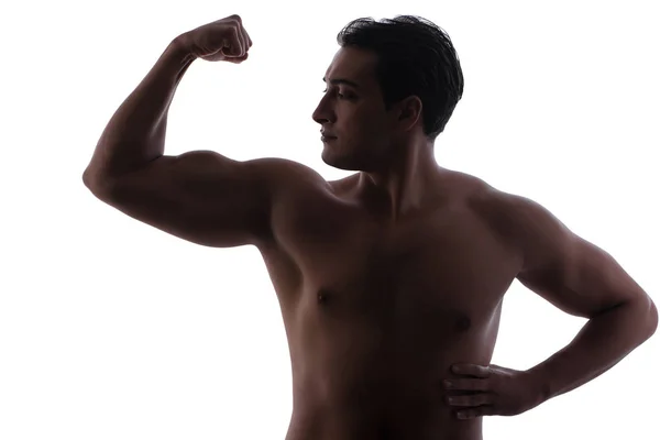 Hombre guapo flexionando sus músculos en blanco —  Fotos de Stock