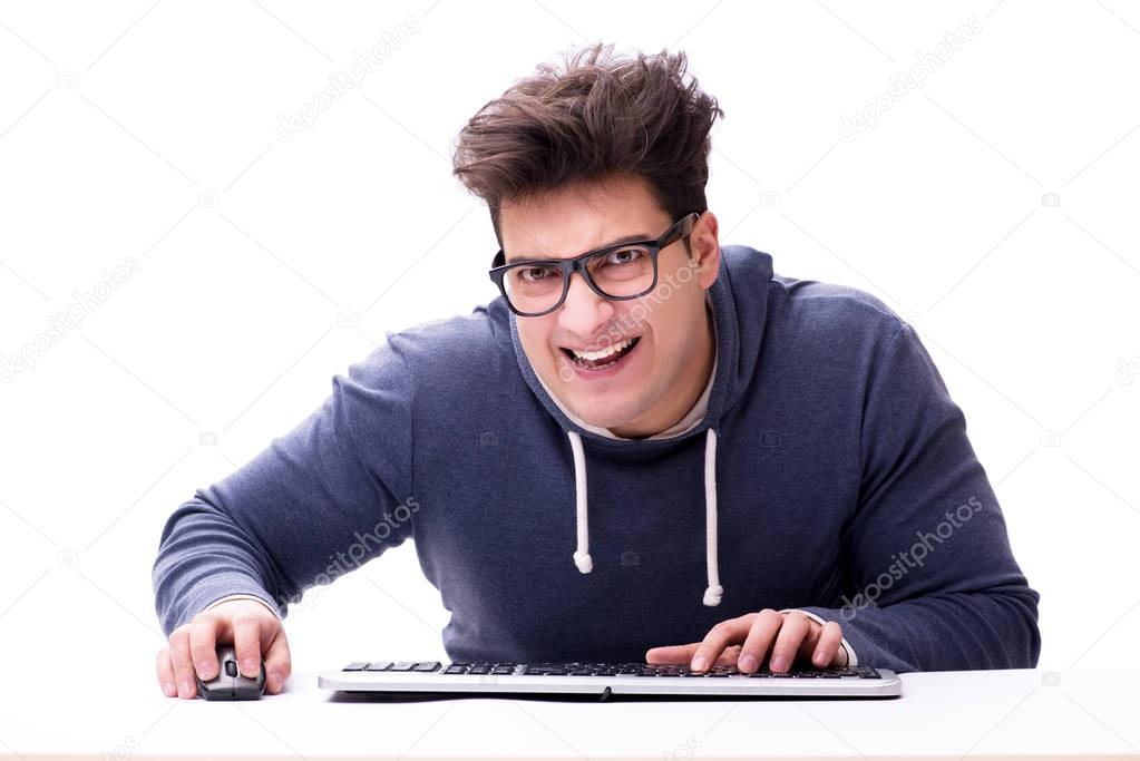 Funny nerd man working on computer isolated on white