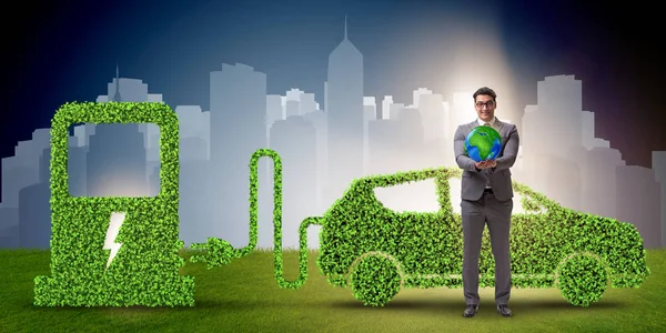 Concepto de coche eléctrico en ambiente verde concepto —  Fotos de Stock