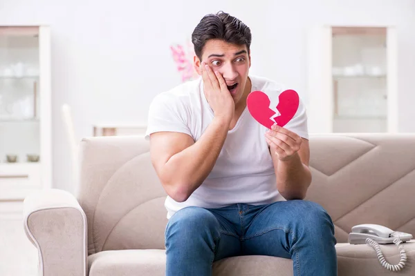 Young man in sad saint valentine concept — Stock Photo, Image