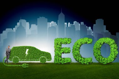Yeşil elektrikli araba konseptinde iş adamı