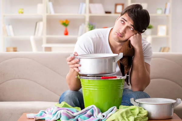 Man at home dealing with neighbor flood leak — Stock Photo, Image