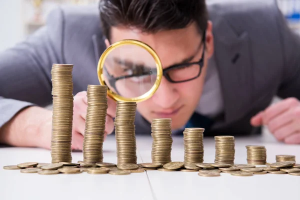 Businessman with golden coins in business growth concept — Stock Photo, Image