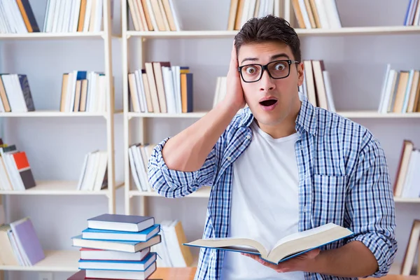 Young student with books preparing for exams — Stock Photo, Image