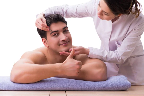 Handsome man in spa massage concept — Stock Photo, Image
