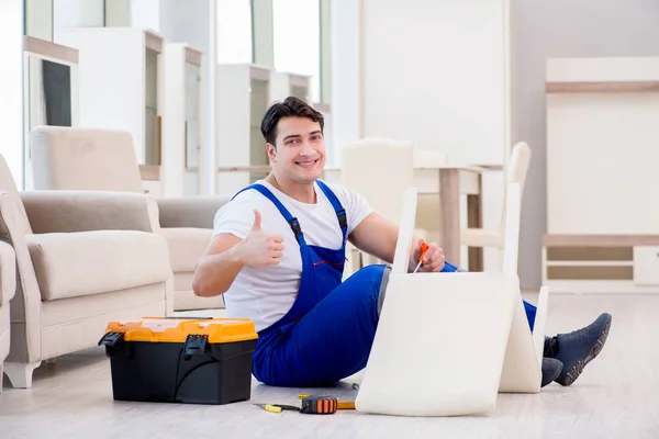 Furniture repairman working in store — Stock Photo, Image