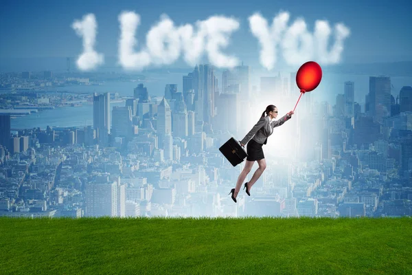 Woman flying balloons in romantic concept — Stock Photo, Image