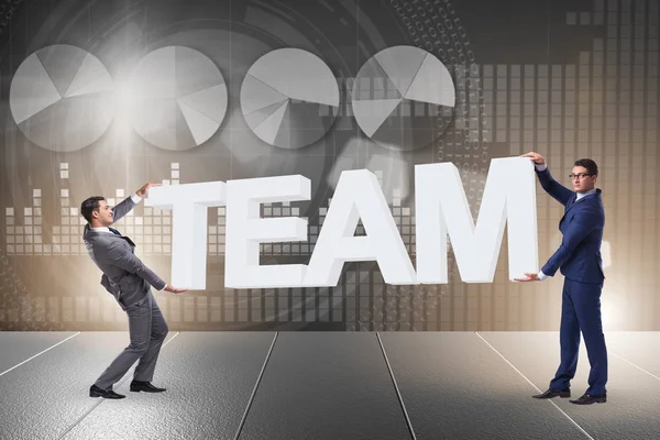 Ondernemers houden woord team in teamwork concept — Stockfoto