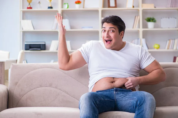 Man suffering from extra weight in diet concept — Stock Photo, Image