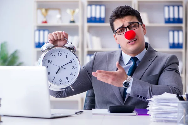 Clown businessman with alarm clock missing dieadline — Stock Photo, Image