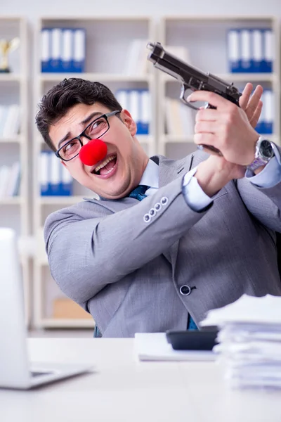 Clown businessman working in the office frustrated committing su