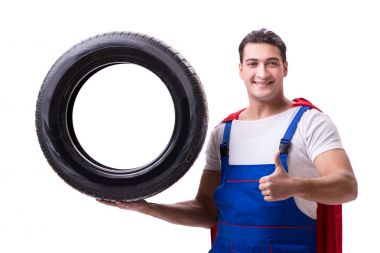 Lastik izole edilmiş beyaz arka planı olan süper kahraman.