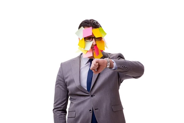 Businessman with many reminders isolated on white — Stock Photo, Image