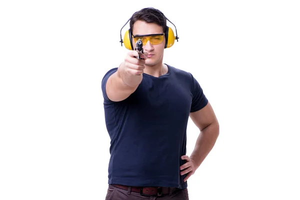 Homem fazendo tiro esportivo de arma isolada em branco — Fotografia de Stock