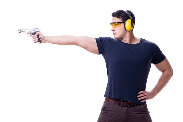 Man doet sport schieten uit pistool geïsoleerd op wit — Stockfoto