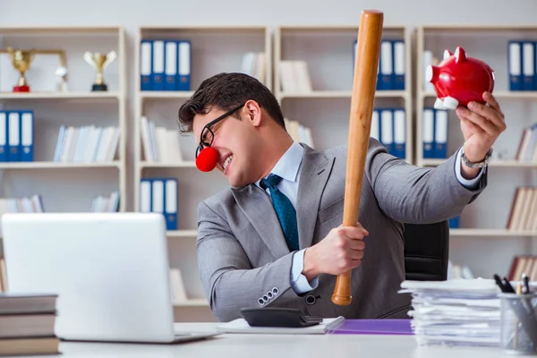 Beyzbol sopası ve kumbaralı palyaço işadamı.