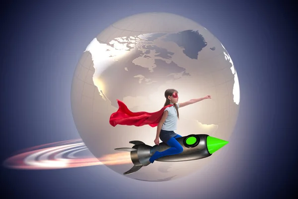 Little girl flying rocket in superhero concept — Stock Photo, Image