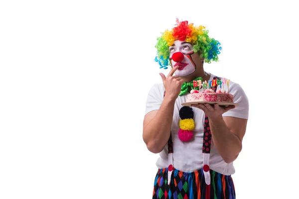 Lustiger Clown mit Geburtstagstorte auf weißem Hintergrund — Stockfoto