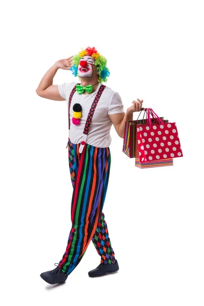Drôle de clown avec des sacs à provisions isolés sur fond blanc — Photo