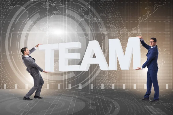 Ondernemers houden woord team in teamwork concept — Stockfoto