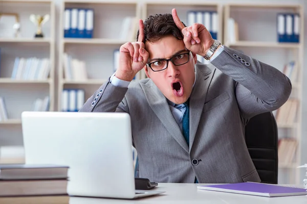 Funny businessman clown acting silly in the office — Stock Photo, Image