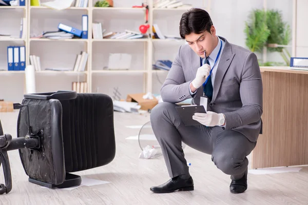 Young man during crime investigation in office — Stock Photo, Image