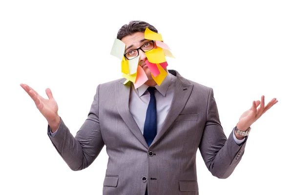 Empresário com muitos lembretes isolados em branco — Fotografia de Stock