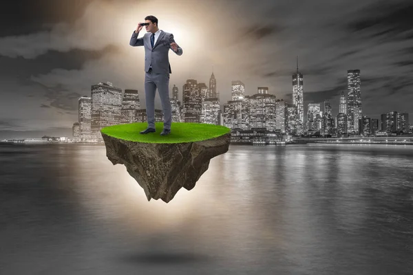 Ada dürbün ile uçan üzerinde işadamı