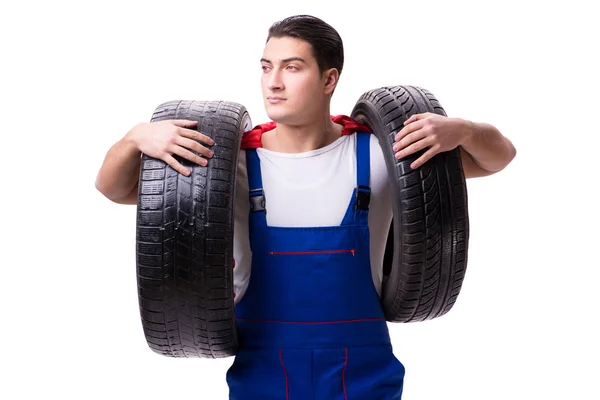 Homem super-herói com pneu isolado fundo branco — Fotografia de Stock