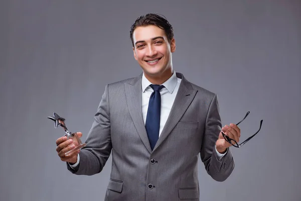 Businessman holding star award in business concept — Stock Photo, Image