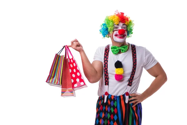 Zabawny clown po torby na zakupy na białym tle — Zdjęcie stockowe