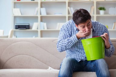 Man suffering from sick stomach and vomiting clipart