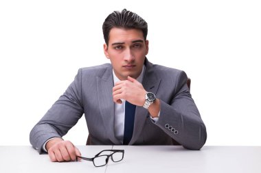 Genç işadamı beyaz arka planda izole edilmiş