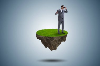 Ada dürbün ile uçan üzerinde işadamı