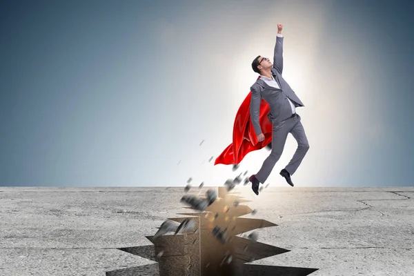 Süper kahraman iş adamı zor durumdan kaçıyor.