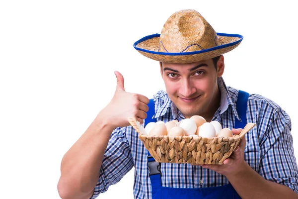 Homme avec un chapeau de paille et des œufs — Photo