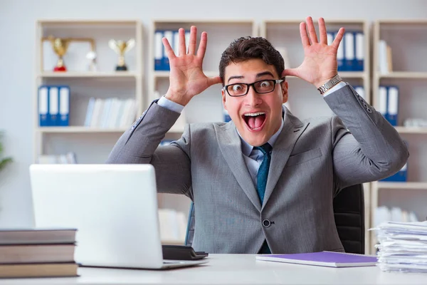 Funny businessman clown acting silly in the office — Stock Photo, Image