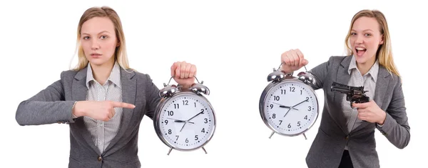 Mujer de negocios en traje gris con reloj despertador aislado en blanco —  Fotos de Stock