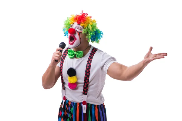 Payaso divertido con un micrófono cantando karaoke aislado en blanco — Foto de Stock