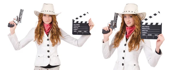 Jeune cowgirl avec pistolet et planche de film isolé sur blanc — Photo