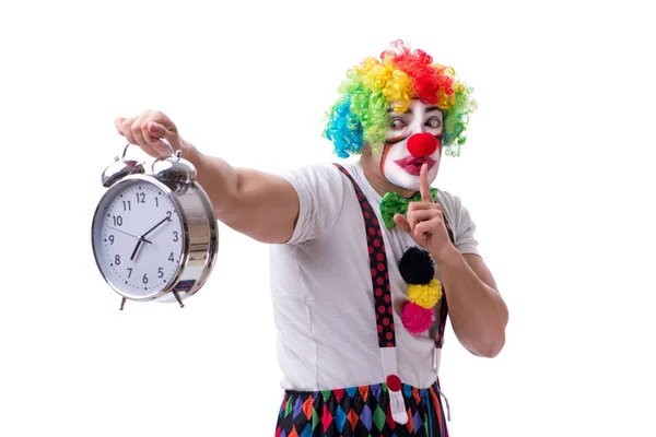 Lustiger Clown mit Wecker auf weißem Hintergrund — Stockfoto