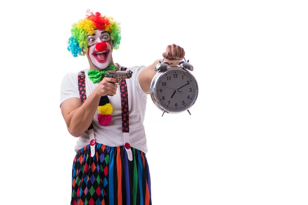 Grappige clown met een wekker geïsoleerd op witte achtergrond — Stockfoto