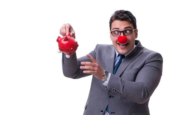 Lustiger Clown-Geschäftsmann mit Sparschwein auf weißem Rücken — Stockfoto